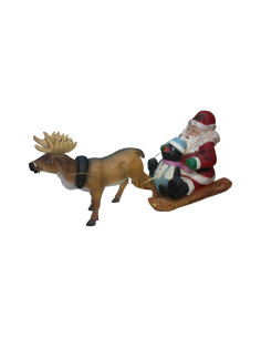 Mikołaj na saniach z pingwinem